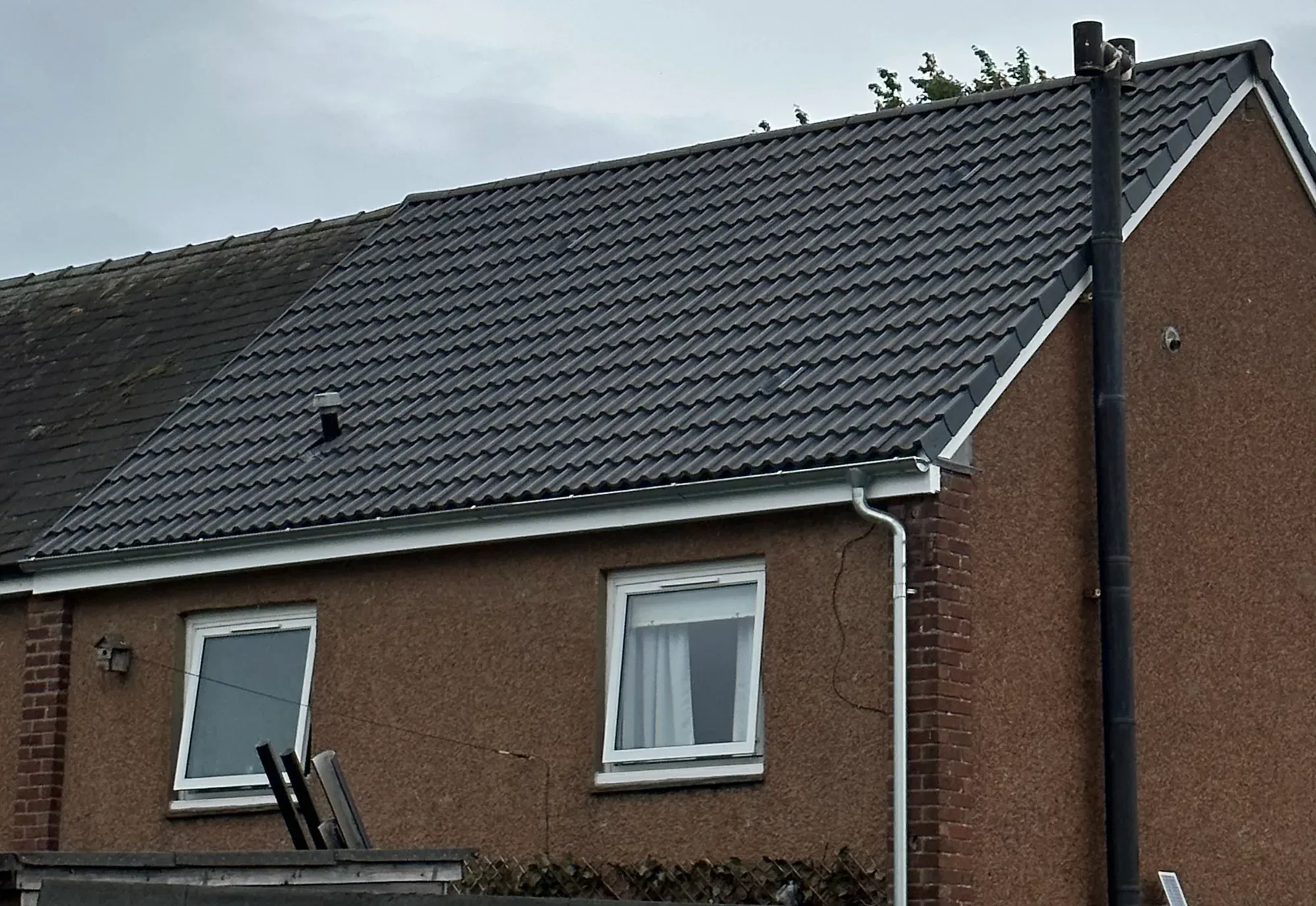 Bungalow re-roof with dry ridge system